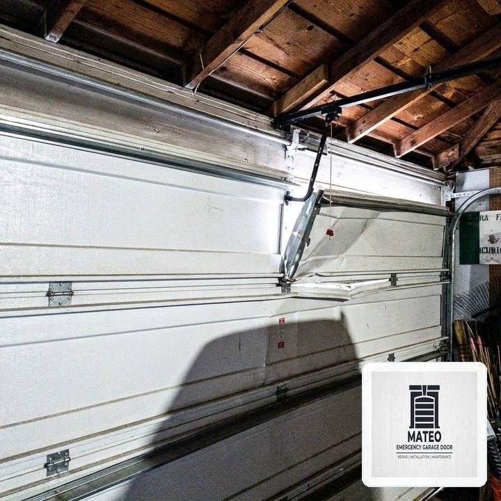 What to Do When Your Garage Door Jumps Off Track in Crossroads, WA
